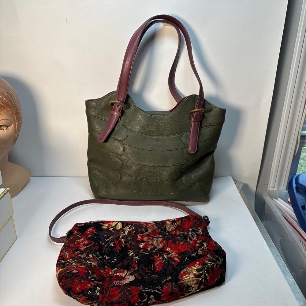 Tusk large designer handbag with matching small bag inside.